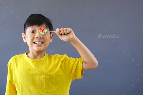 Lollipop Boy Stock Photo By Garakta Studio Photodune